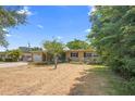 Charming single-story home featuring an attached garage and traditional design at 2327 Mulbry Dr, Winter Park, FL 32789