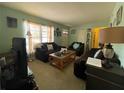 A cozy living room filled with plush furniture, creating an inviting space for relaxation at 2332 Hadley St, Deltona, FL 32738
