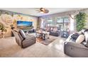 Cozy living room with a large screen TV and comfortable seating at 316 Nowell Loop, Deland, FL 32724