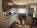 Functional kitchen offering ample counter space, wood cabinets, and natural light at 317 Inwood Ave, New Smyrna Beach, FL 32168