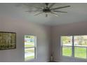 Bright bedroom with large windows providing ample natural light at 707 Hamilton St, New Smyrna Beach, FL 32168