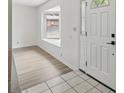Bright entryway with new wood flooring, fresh paint, and lots of natural light at 1209 James Ter, Daytona Beach, FL 32117