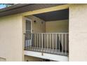 Covered outdoor patio with railings and door to the home, providing a private outdoor space at 1601 Big Tree Rd # 1301, South Daytona, FL 32119