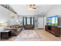 Inviting living room with tile floors, vaulted ceilings, and neutral paint at 2110 3Rd Ave, Deland, FL 32724