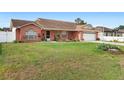 Beautiful single-story home with a spacious front lawn and charming curb appeal at 2287 Belen Dr, Deltona, FL 32738
