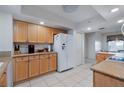 Spacious kitchen with stainless steel appliances, granite countertops, and ample cabinet space at 3145 S Atlantic Ave # 503, Daytona Beach Shores, FL 32118