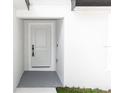 Close-up of the new home's front door, showing its fresh, modern design at 544 E Voorhis Ave, Deland, FL 32724