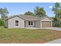 Inviting single-story home with a spacious lawn at 560 Sumner Ave, Orange City, FL 32763