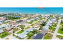 Aerial view of a residential neighborhood with close beach access at 114 Ocean Aire N Ter, Ormond Beach, FL 32176