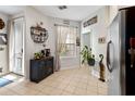 Bright kitchen nook featuring tile floors, plant accents, and ample natural light at 191 Sedona Cir, Daytona Beach, FL 32124
