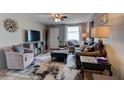 Stylish living room featuring modern furnishings, a decorative rug, and a welcoming atmosphere at 26 Ocean Shore Dr, Ormond Beach, FL 32176