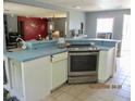 Well-equipped kitchen featuring stainless steel appliances and ample counter space at 3788 Fir Ct, Ormond Beach, FL 32174