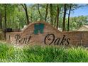 A brick sign at the Bent Oaks Community welcomes residents and guests at 1637 Bent Oaks Blvd, Deland, FL 32724