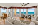 Cozy living room with ocean views, comfortable seating, and elegant decor at 2901 S Atlantic Ave # 401, Daytona Beach Shores, FL 32118