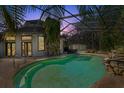 Enjoy Florida living with this screened pool and outdoor dining area, perfect for relaxation and entertaining at 5721 John Anderson Hwy, Flagler Beach, FL 32136