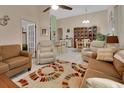 Open-concept living area showcases tile flooring, neutral decor, and comfortable seating at 1125 Stillwater Dr, Deland, FL 32720