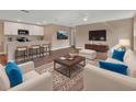 Modern living room showcasing hardwood floors, stylish furniture and a flat screen TV at 1226 North St, Daytona Beach, FL 32114