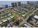 An aerial shot shows property location with walkable beach access and nearby vehicle beach access at 3267 S Peninsula Dr, Daytona Beach, FL 32118