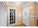 Entryway with closet and front door with decorative glass at 558 Tulane Dr, Altamonte Springs, FL 32714