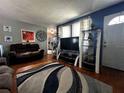 Inviting living room with hardwood floors, featuring modern decor and comfortable seating at 601 Berkshire Rd, Daytona Beach, FL 32114