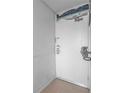 Apartment entryway featuring a white door and nautical decor at 935 S Atlantic Ave # 505, Daytona Beach, FL 32118