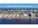 Aerial shot of Riverside Condominiums community on the water with amazing city views at 2711 N Halifax Ave # 264, Daytona Beach, FL 32118