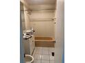 Cozy bathroom featuring a tiled shower, a vanity, and neutral tones for a functional and tidy space at 621 W Indiana Ave # 13, Deland, FL 32720