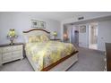 Comfortable main bedroom with ensuite bathroom access, ample space, and closet at 2800 N Atlantic Ave # 1716, Daytona Beach, FL 32118
