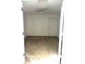 Neutral carpet in bedroom with ceiling fan and closet door at 3155 Mapleshade St, Deltona, FL 32738