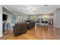 Spacious living room open to the kitchen and dining area with lots of natural light at 3671 Plantation Dr, Ormond Beach, FL 32174