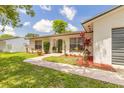Charming home with well-maintained landscaping and inviting walkway at 4 Brandy Hills Dr, Port Orange, FL 32129