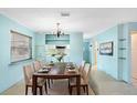 Inviting dining area with a view into the kitchen, perfect for Gathering meals at 507 Sand Ave, Apopka, FL 32703