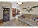 Inviting living room with hardwood flooring, neutral paint and comfortable seating at 1020 N Orange Ave, Orange City, FL 32763