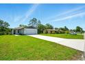 Lovely single-Gathering home with an extra long driveway and a convenient two-car garage at 1161 Kenway Ave, Deltona, FL 32738