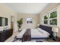 A soothing bedroom with a cozy rug, a modern bed and a calming ambiance at 1612 W Grant St, Orlando, FL 32805
