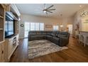 Spacious living room with vaulted ceilings, wood floors, and lots of natural light at 19232 Park Place Blvd, Eustis, FL 32736