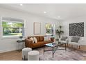 Cozy living room featuring neutral walls, modern furniture and abundant natural light at 3655 Scott St, Port Orange, FL 32129