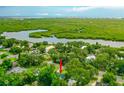 A beautiful aerial view of the property with the intercoastal waterway in the distance at 812 Faulkner St, New Smyrna Beach, FL 32168