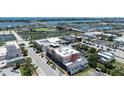 Breathtaking aerial view showcasing the property near a stadium and waterfront at 208 Wall St # 204, Daytona Beach, FL 32114