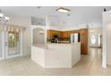 Bright kitchen with stainless steel appliances and breakfast bar at 2478 Unionville Dr, Deltona, FL 32725