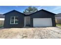 New construction with a large garage, modern color scheme at 822 W 24Th St, Sanford, FL 32771