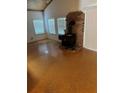 Spacious living room with a wood burning stove at 110 Amigos Rd, Debary, FL 32713
