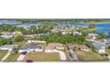 An aerial view shows the home's proximity to serene lakes and its place within the established neighborhood at 2080 Roseway Ave, Deltona, FL 32738