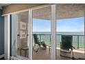 Relaxing balcony with comfortable seating overlooking the ocean at 3315 S Atlantic Ave # 1605, Daytona Beach Shores, FL 32118