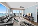 Bright living room featuring ocean views and a comfortable seating area at 3315 S Atlantic Ave # 1605, Daytona Beach Shores, FL 32118