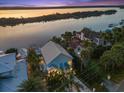 An aerial view of the home showcases its proximity to the river at 3110 John Anderson Dr, Ormond Beach, FL 32176