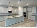 Spacious kitchen with granite countertops and stainless steel appliances at 260 Crossings Ave, St Cloud, FL 34771