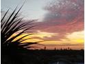 Stunning sunset view from the property at 3700 S Atlantic Ave # 405, New Smyrna Beach, FL 32169