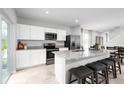 Modern kitchen with stainless steel appliances and granite countertops at 281 Tahiti Rd, Lady Lake, FL 32159