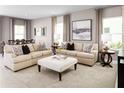 Spacious living room with beige couches and patterned pillows at 7405 Sw 108Th St, Ocala, FL 34476